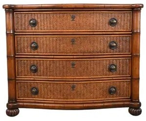 PAIR OF TOMMY BAHAMA FAUX BAMBOO DRESSERS: TOMMY BAHAMA FAUX BAMBOO CHEST OF DRAWERS-This stylish Tommy Bahama chest of drawers features signature island-inspired design with a faux bamboo frame, gently bowed front, and woven rattan-style