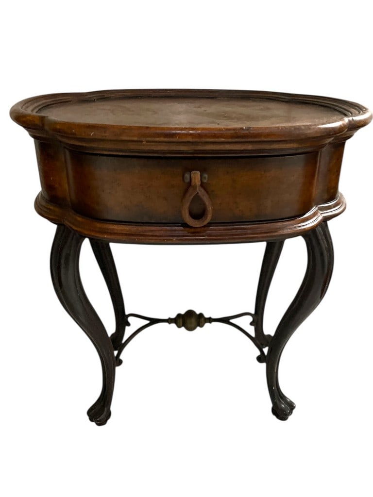 OVAL WOOD ACCENT TABLE WITH CABRIOLE LEGS 24": OVAL WOOD ACCENT TABLE WITH CABRIOLE LEGS -Charming oval accent table crafted in a warm, aged wood finish, featuring a raised gallery top and a single discreet drawer accented with a classic teardrop