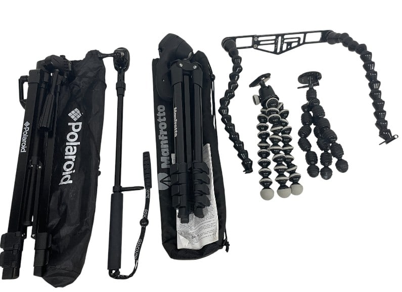 CAMERA SUPPORT ACCESSORY LOT TRIPODS & MOUNTS: CAMERA SUPPORT ACCESSORY LOT – TRIPODS & FLEXIBLE MOUNTS -Very good pre owned condition -Useful assortment of camera support accessories including multiple compact tripods and flexible mounting syst