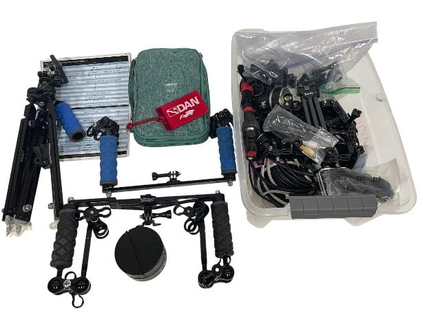 UNDERWATER CAMERA RIG AND ACCESSORY LOT: UNDERWATER CAMERA RIG AND ACCESSORY LOT -Good pre owned condition, see photos -Extensive underwater camera rig and accessory lot designed for action cameras and compact underwater filming setups. The