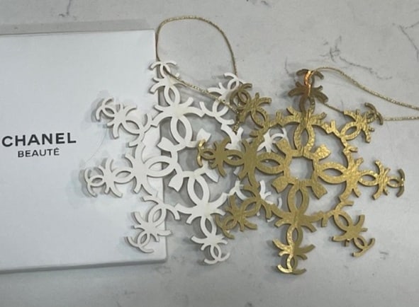 NEW CHANEL GIFT 3D GOLD WHITE SNOWFLAKE ORNAMENT: - AUTHENTIC Chanel Gift With Purchase Item- Ornament but could be hung year round and snow is happening now! - Gold and White half and half - New in box - stays flat until "spread out" MSN- 11" TALL