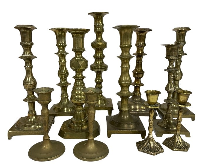 COLLECTION OF 12 VINTAGE BRASS CANDLESTICKS: COLLECTION OF 12 VINTAGE BRASS CANDLESTICKS -Good pre owned condition, some wear from age and use -12 candlesticks -Impressive mixed collection of vintage brass candlesticks and candle holders in vary