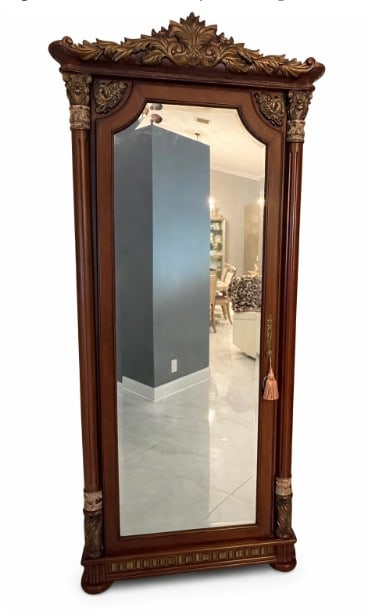 ORNATE CARVED FLOOR MIRROR W INTERIOR STORAGE 90": VILLA VALENCIA ORNATE CARVED FLOOR MIRROR WITH HIDDEN STORAGE AND INTERIOR SHELVING -Impressive full-length floor mirror featuring a richly carved wood frame with an arched crest, classical scrollwork