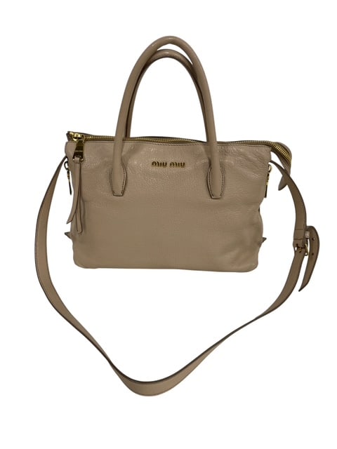 MIU MIU MADRAS BEIGE PINK LEATHER SHOULDER BAG: - Luxurious Miu Miu Madras model purse - Measures 12" x 9" x 3.5" - Color is pink but has more of a beige tone - 2 way leather - Excellent condition inside and out - Shoulder bag purse that you can't