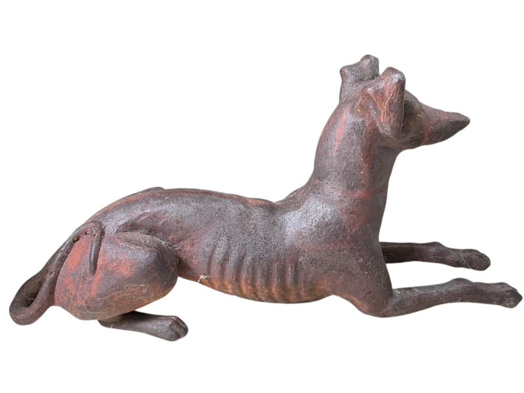 CAST IRON GREYHOUND SCULPTURE ATTR. TO J.W. FISKE: 19TH CENTURY CAST IRON GREYHOUND SCULPTURE ATTRIBUTED TO J.W. FISKE -Large-scale 19th century cast iron garden sculpture depicting a reclining greyhound, attributed to J.W. Fiske. This finely modeled