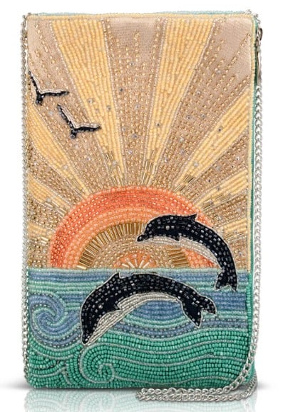 NEW MARY FRANCES FLIP FOR JOY SUNSET AND DOLPHINS: Bring sunny, seaside vibes wherever you go with this beautiful beaded crossbody! A glowing sunset, playful dolphins, and shimmering waves create a scene full of warmth and movement. Perfect for ocean
