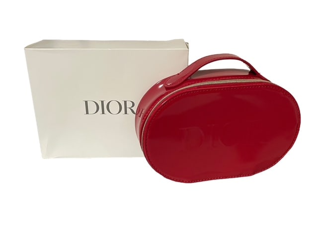 DIOR BEAUTY RED PATENT LOGO EMBOSSED MINI EVE BAG: - Dior beauty bag inspired by Louboutin soles! - Bold red patent pleather material - Nice cute size on this about 5" wide - Perfect to wear with those Louboutins or cute red sexy dress for an eve out
