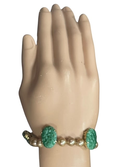 VTG MARVELLA CARVED PEKING GLASS PEARLS BRACELET: - Vintage Marvella signed bracelet - NOTE AS IS - one strand of pearls is missing but the stones hang nice! - Peking Glass Faux Jade carved cabachons on vintage pearls strung. - Good condition other t