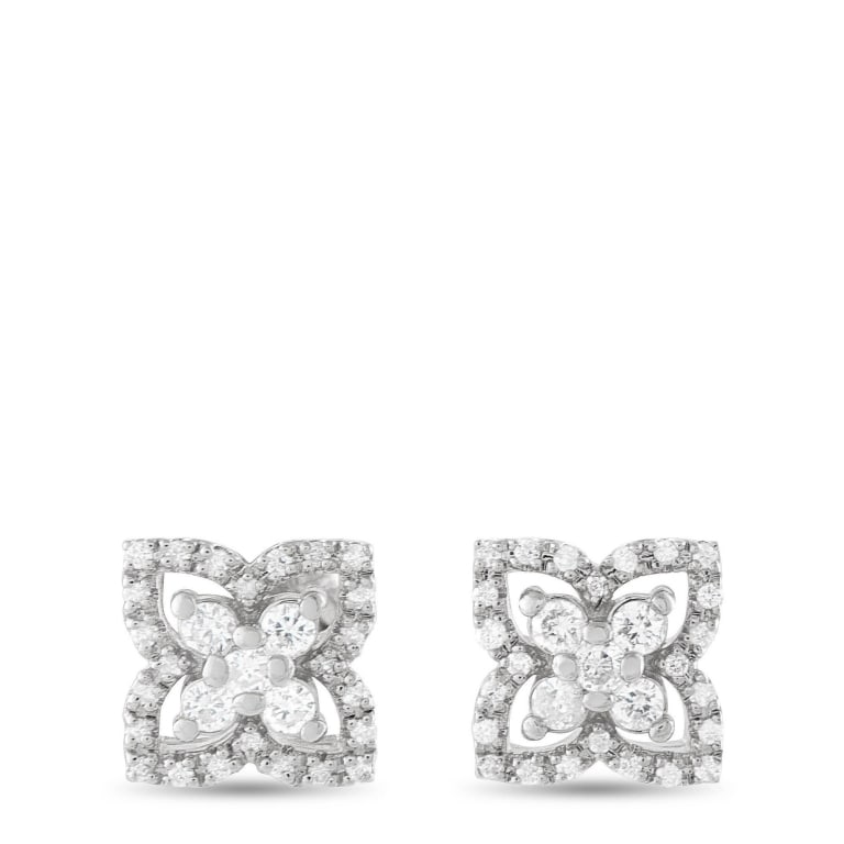 14K WHT GOLD 0.25CT DIAMOND EARRINGS: These elegant earrings are perfect for any occasion. Diamonds with a total weight of 0.25 carats at the center of the design makes them instantly captivating. Set in 14K White Gold, each earring measu
