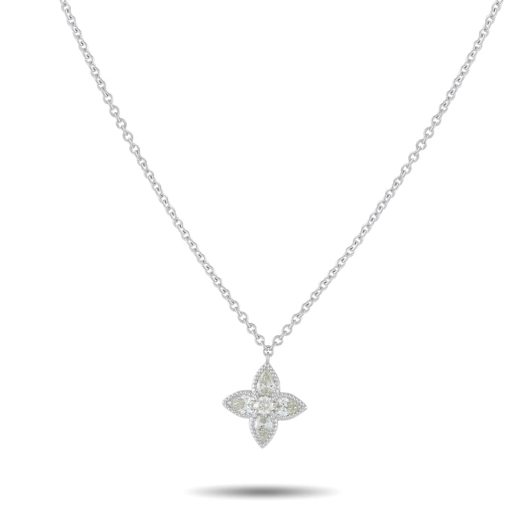 18K WHITE GOLD 0.73CT DIAMOND QUATREFOIL NECKLACE: Softly feminine with a timeless character, this classic necklace centers on a pointed quatrefoil pendant crafted in white gold. Each of the four tops is edged with fine beading and set with a pear-cut