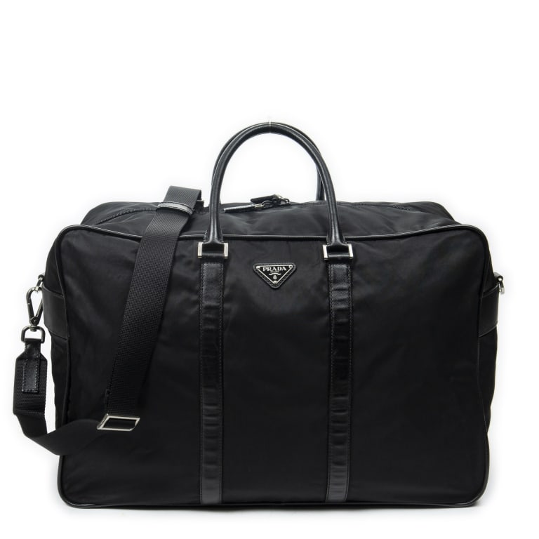PRADA LARGE SOFT BOSTON TRAVEL BAG: *For ALTERNATIVE SHIPPING QUOTES, please visit www.dejavuauctionshipping.com* Prada Large Travel Soft Boston Black Nylon Canvas Silver * COLOR: Black * PRODUCTION CODE: 31 * INCLUDED: Silver 50*35*28c