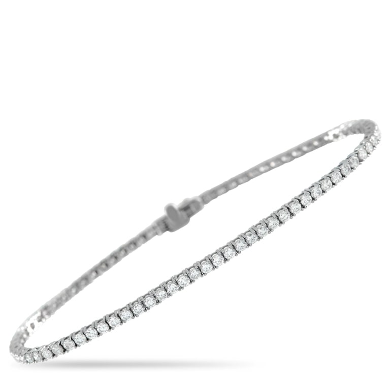 18K WHITE GOLD 2.90CT DIAMOND TENNIS BRACELET: The kind of jewel that slips into your day without fuss. This diamond tennis bracelet features 2.90 carats of diamonds, offering a steady shimmer that works almost anywhere you take it. Each diamond s