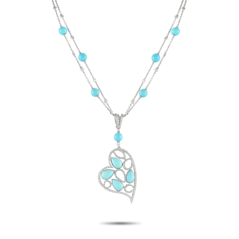 18K WHITE GOLD 1.05CT DIAMOND TURQUOISE NECKLACE: Theres something incredibly captivating about this exquisite luxury necklace. Turquoise stones add color to the entire design, while sparkling Diamonds totaling 1.05 carats provide plenty of sparkle.