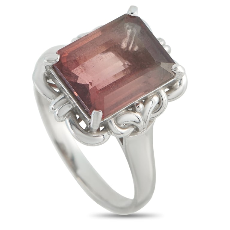 PLATINUM 5.01CT TOURMALINE RING MF19- SIZE 7.25: Detailed metalwork adds elegance to this impeccably crafted ring. Set in Platinum, this pieces 5.01 carat Tourmaline center stone makes it instantly captivating. A 2mm wide band and a 6mm top height m