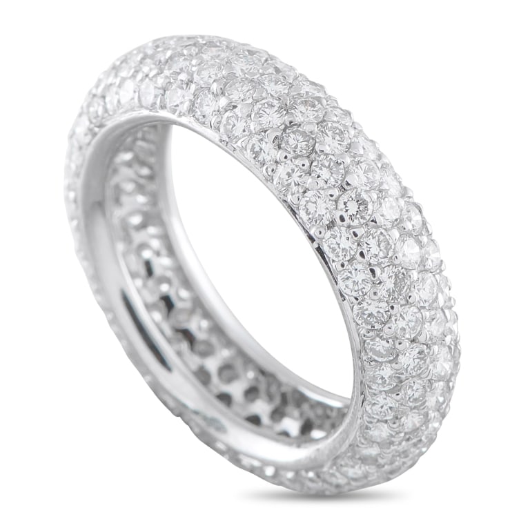 18K WHITE GOLD 3.50CT DIAMOND ETERNITY RING 6.25: With an all-over shimmer, this ring is meant to be seen. This high-domed eternity ring in white gold is fully pav-set with diamonds that wrap continuously around the band. Across the 9mm wide band are