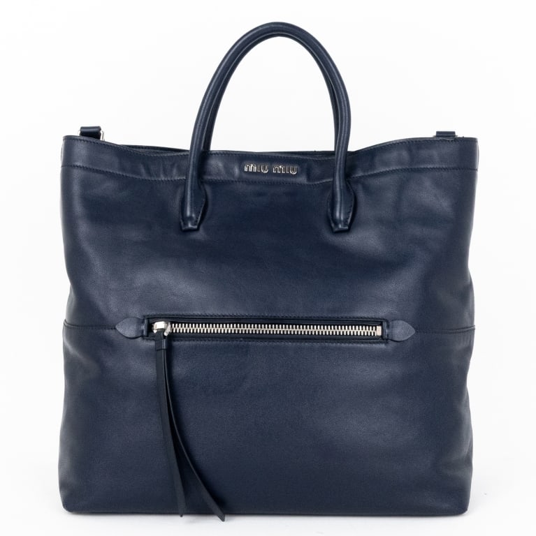 MIU MIU NAVY BLUE CALFSKIN SHOPPER TOTE: *For ALTERNATIVE SHIPPING QUOTES, please visit www.dejavuauctionshipping.com* Miu Miu Shopper Tote Navy Blue Calfskin Smooth Leather Gold * COLOR: Navy Blue * PRODUCTION CODE: 31/Y * INCLUDED: Dustbag