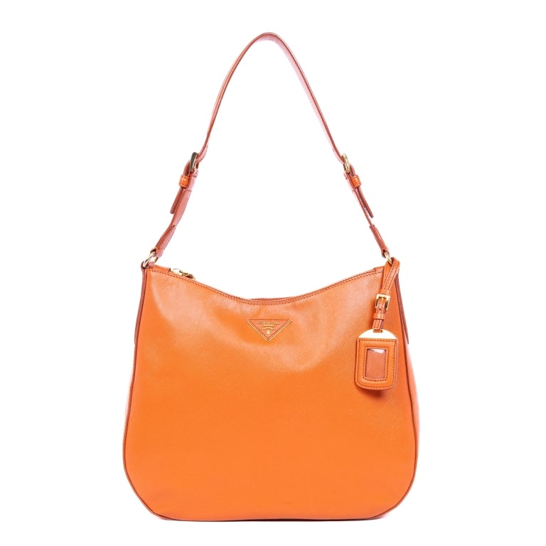 PRADA SAFFIANO HOBO ORANGE SAFFIANO LUX LEATHER G: *For ALTERNATIVE SHIPPING QUOTES, please visit www.dejavuauctionshipping.com* Prada Saffiano Hobo Orange Saffiano Lux Leather Gold * COLOR: Orange * PRODUCTION CODE: 173 * INCLUDED: Dustbag, Luggage T