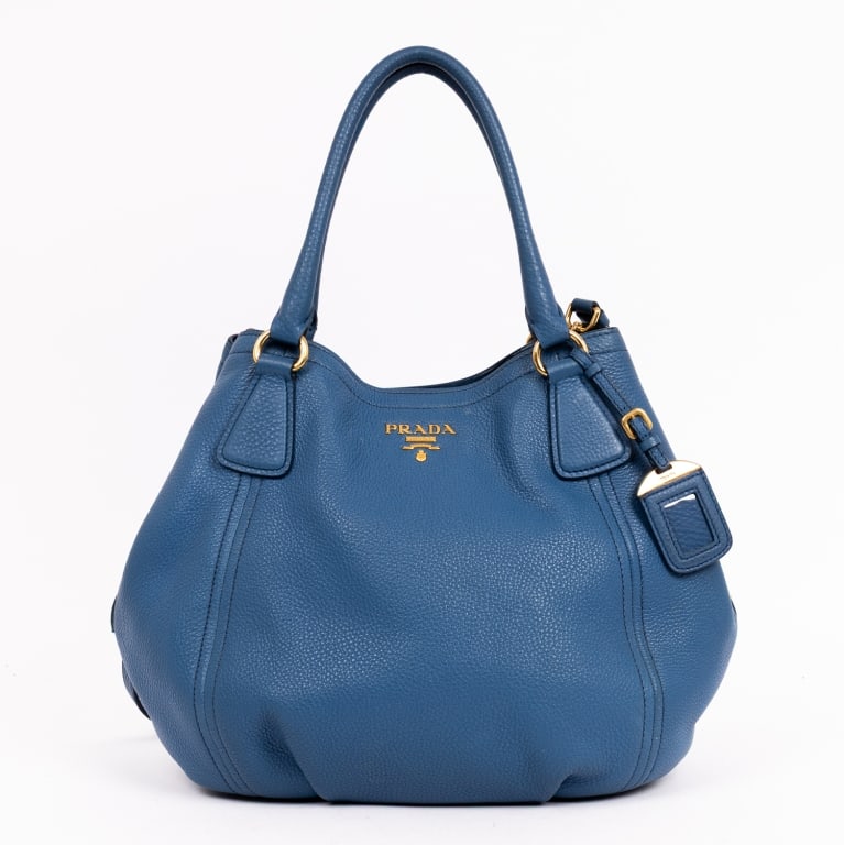 PRADA CROSSBODY TOTE BLUE VITELLO DAINO LEATHER G: *For ALTERNATIVE SHIPPING QUOTES, please visit www.dejavuauctionshipping.com* Prada Crossbody Tote Blue Vitello Daino Leather Gold * COLOR: Blue * PRODUCTION CODE: B2343M / 113 * INCLUDED: Strap, Lugg