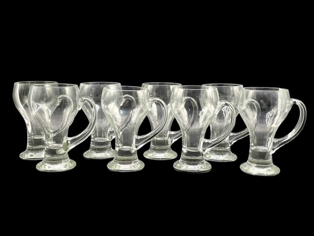 SET OF 8 GLASS BEER OR ALE MUGS 7": SET OF 8 GLASS BEER OR ALE MUGS 7"-VERY GOOD PRE OWNED CONDITION-APPROX 7" X 3.5"-CLASSIC PUB STYLE DESIGN WITH A SLIGHTLY FLARED FORM, PERFECT FOR SERVING BEER, ALE, OR CIDER-JA 082825By bidding on