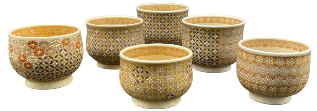JAPANESE SATSUMA STYLE HAND-PAINTED TEA BOWLS: JAPANESE SATSUMA STYLE HAND-PAINTED TEA BOWLS THIS STUNNING SET OF SIX JAPANESE CERAMIC TEA BOWLS FEATURES INTRICATE HAND-PAINTED DESIGNS IN THE TRADITIONAL SATSUMA STYLE. EACH BOWL IS ADORNED WITH EL
