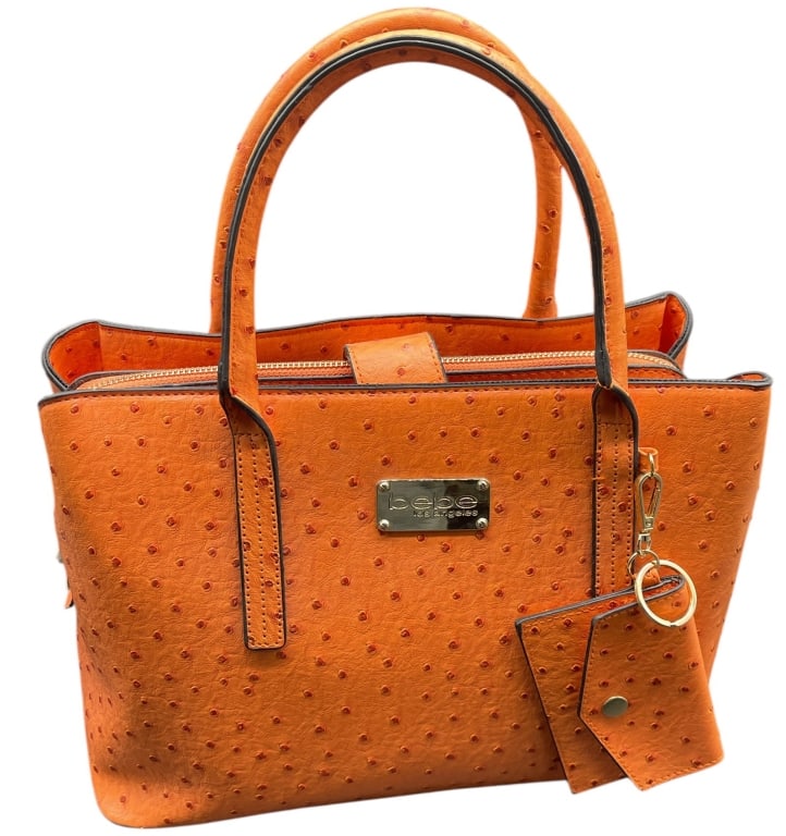 BEBE ORANGE OSTRICH EMBOSSED HANDBAG SET: THIS STYLISH BEBE HANDBAG IS CRAFTED FROM VIBRANT ORANGE VEGAN LEATHER FEATURING A SOPHISTICATED OSTRICH-EMBOSSED TEXTURE THROUGHOUT. THE TOTE-STYLE BAG INCLUDES DUAL ROLLED TOP HANDLES AND COMES WITH