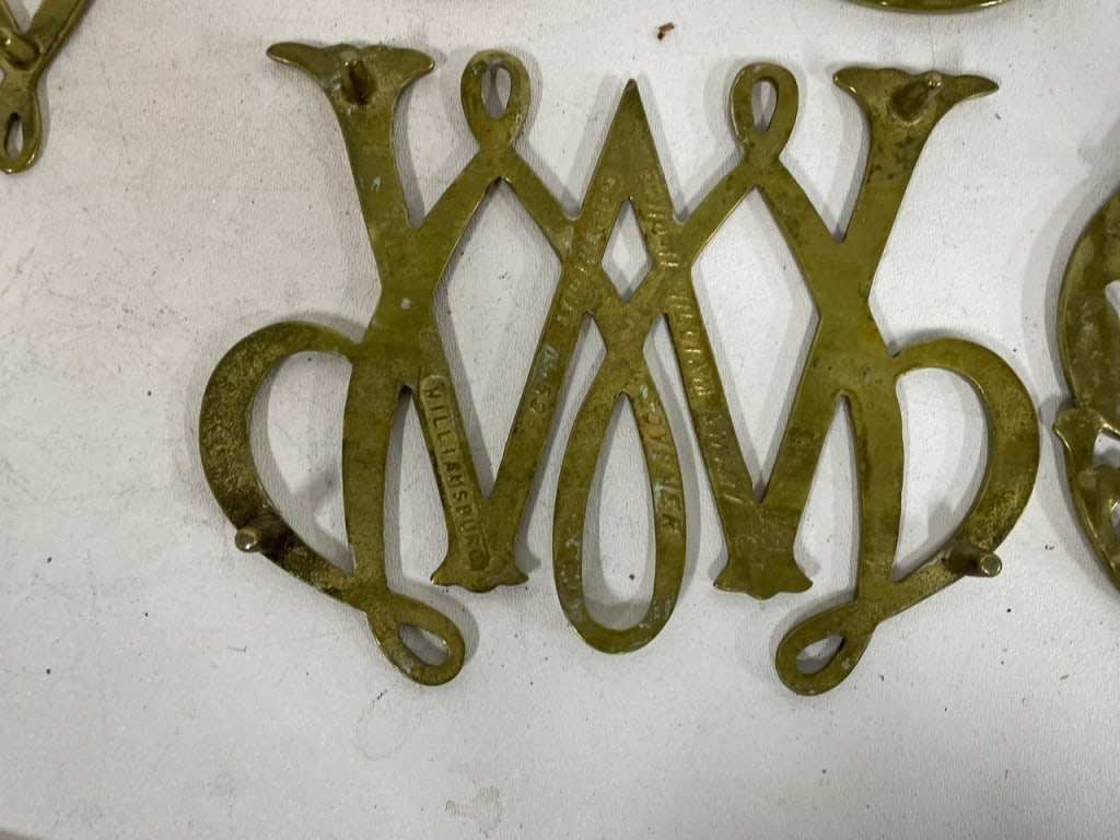 DECORATIVE BRASS MONOGRAM & SCROLLWORK TRIVETS - 12