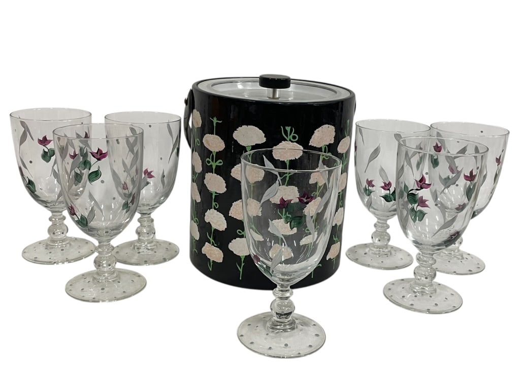 HAND-PAINTED GLASSWARE SET WITH ICE BUCKET: HAND-PAINTED GLASSWARE SET WITH ICE BUCKET – FLORAL MOTIF -Elegant hand-painted glassware set featuring floral and leaf motifs in soft tones. Includes multiple stemmed glasses paired with a coordina