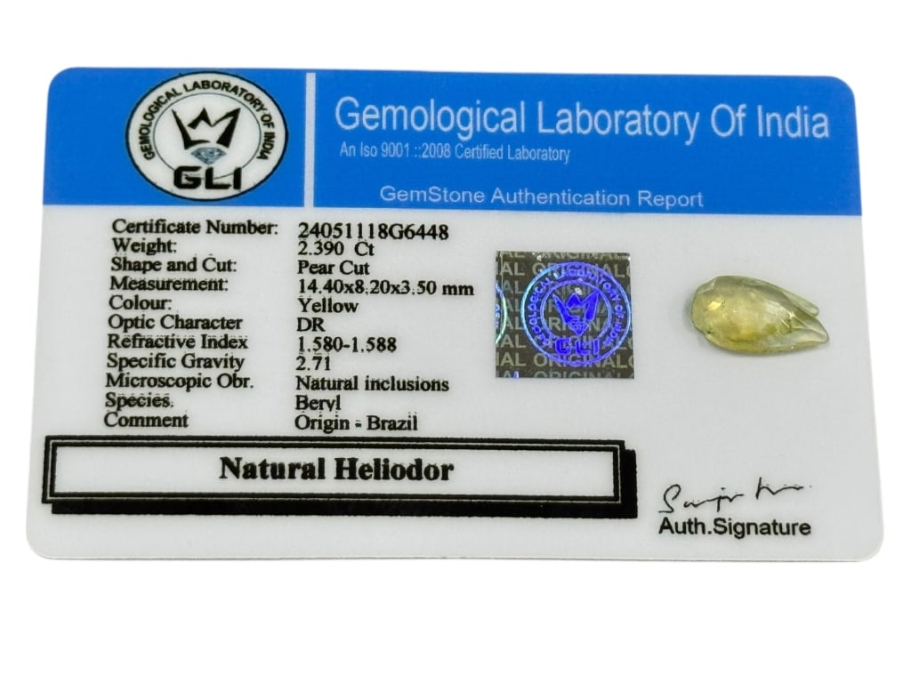 NATURAL HELIODOR – 2.39 CT PEAR CUT: NATURAL HELIODOR – 2.39 CT PEAR CUT -This certified Natural Heliodor weighs approximately 2.390 carats and features a pear-cut design measuring about 14.40 x 8.20 x 3.50 mm. Displaying a clear yello