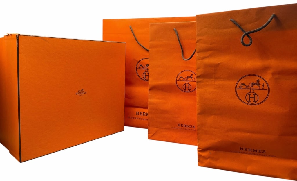 Authentic Hermès "Orange 93" Packaging Collection: Authentic Hermès "Orange 93" Packaging Collection This authentic collection features the iconic signature packaging from the French luxury house Hermès. Known as "Orange 93," this distinctive hue be