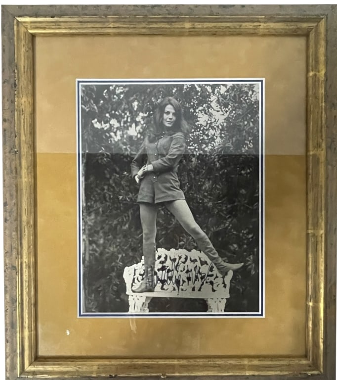 Photograph of Natalie Wood HAND SIGNED: This framed photograph of Natalie Wood is a significant collector's item, as her authentic hand-signed autographs are highly sought after by film history enthusiasts. This piece is described as a "Pro