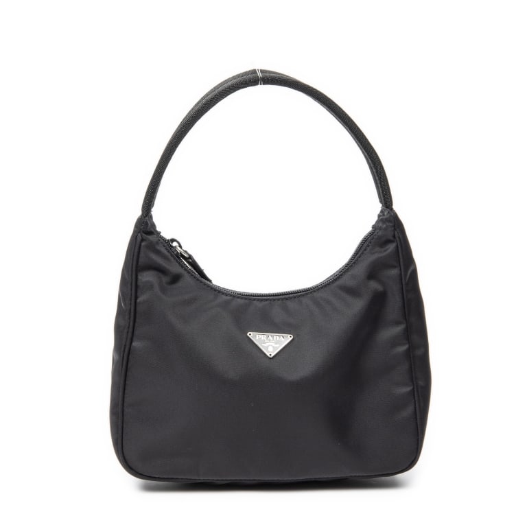 PRADA VINTAGE MINI ZIP NYLON CANVAS HOBO: *For ALTERNATIVE SHIPPING QUOTES, please visit www.dejavuauctionshipping.com* Prada Vintage Mini Zip Hobo Nylon Canvas * COLOR: Black * PRODUCTION CODE: 59 * INCLUDED: None 21*19*8cm * CONDITION: AA *