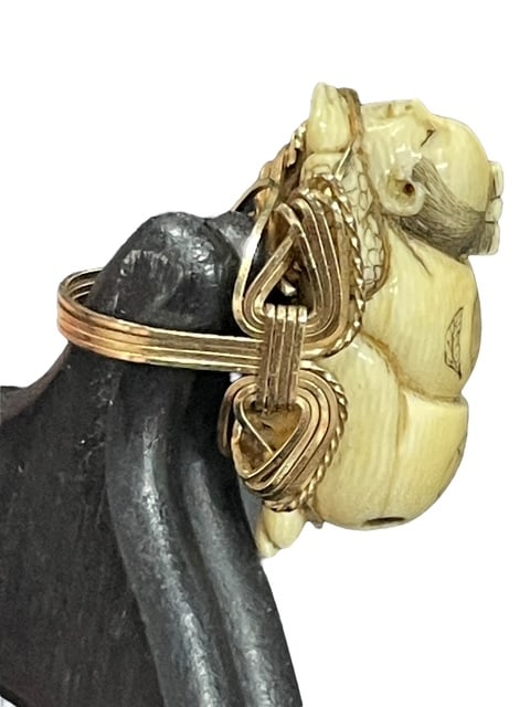 CARVED BONE ASIAN BUDDHA ON GOLD ARTISAN RING 6: *For ALTERNATIVE SHIPPING QUOTES or local PICKUP details, please visit www.dejavuauctionshipping.com*Beautiful artisan created Buddha ring with gold filled coiling on the ring or back side and a