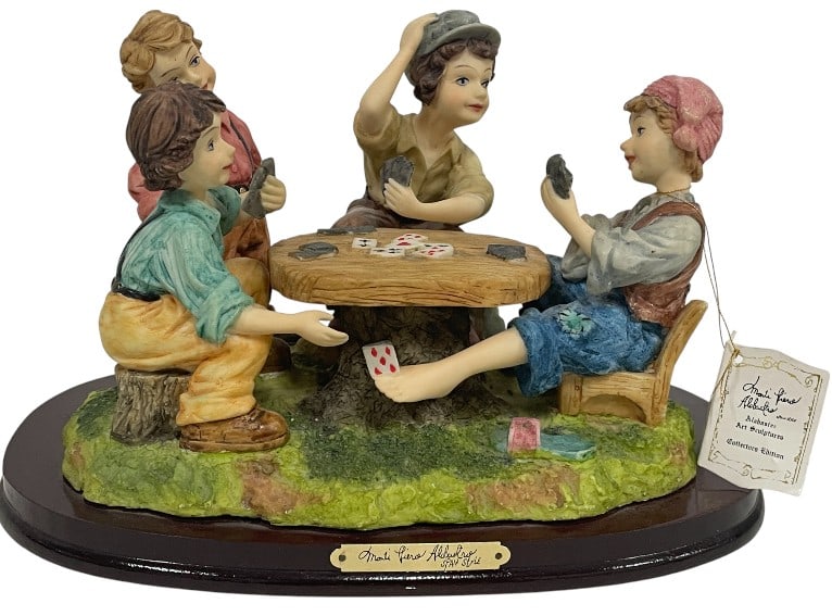 MONTEFIORI ALABASTER BOYS PLAYING CARDS FIGURINE: ****for competitive shipping options please go to www.dejavuauctionshipping.com -MONTEFIORI ALABASTER BOYS PLAYING CARDS FIGURINE 11" -Very good pre owned condition -Approx 8"h x 11"w -Original retail