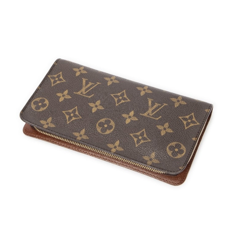 LOUIS VUITTON PORTE-MONNAIE ZIP MONOGRAM WALLET: *For ALTERNATIVE SHIPPING QUOTES, please visit www.dejavuauctionshipping.com* Louis Vuitton Porte-Monnaie Zip Brown Monogram Canvas Golden Brass * COLOR: Brown * PRODUCTION CODE: CA1002 (Oct 2002)