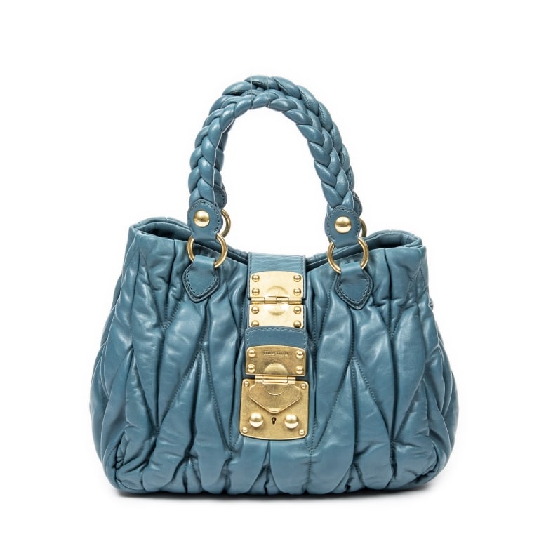 MIU MIU BAULETTO APERTO TEAL MATELASSE LEATHER BAG: *For ALTERNATIVE SHIPPING QUOTES, please visit www.dejavuauctionshipping.com* Miu Miu Bauletto Aperto Teal Matelasse Leather Gold * COLOR: Teal * PRODUCTION CODE: 197 * INCLUDED: Strap, Key in
