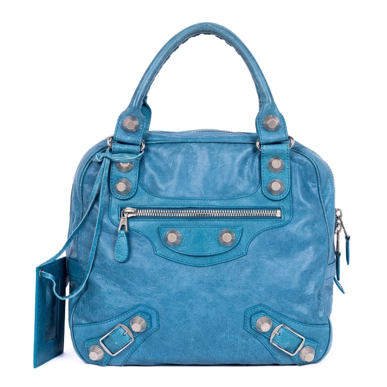 BALENCIAGA GIANT STREET BOWLER 21 BLUE DISTRESSED: *For ALTERNATIVE SHIPPING QUOTES, please visit www.dejavuauctionshipping.com* Balenciaga Giant Street Bowler 21 Blue Distressed Leather Silver * COLOR: Blue * PRODUCTION CODE: 224902-460600-2123 * INC