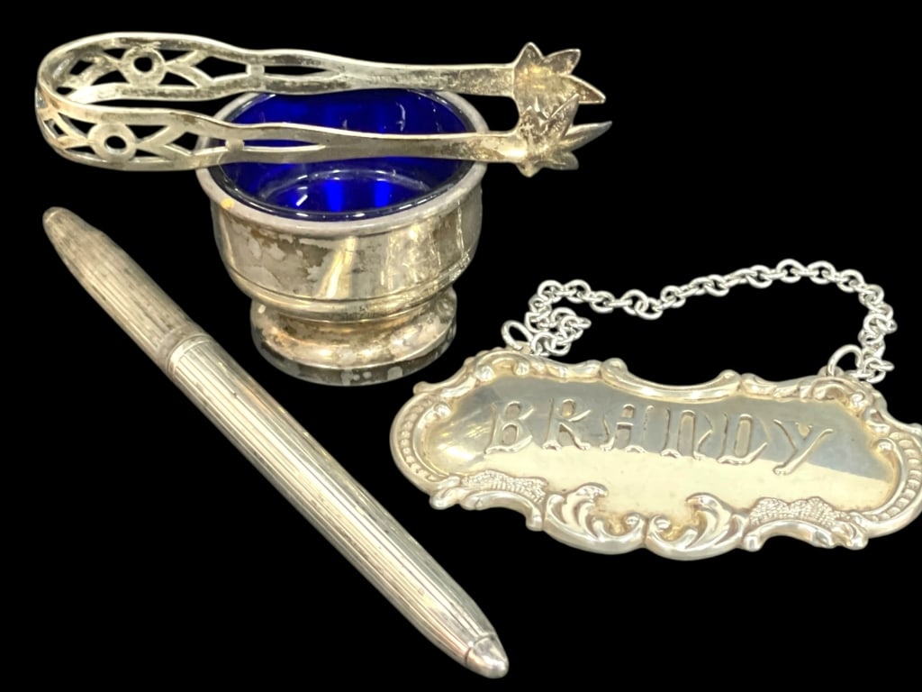 STERLING SILVER ACCESSORIES GROUP 50 GRAMS: STERLING SILVER ACCESSORIES GROUP, 50 GRAMS TOTAL WEIGHT -Assorted sterling silver desk and vanity accessories comprising a cobalt blue glass inkwell housed in a sterling mount, an ornate sterling sug