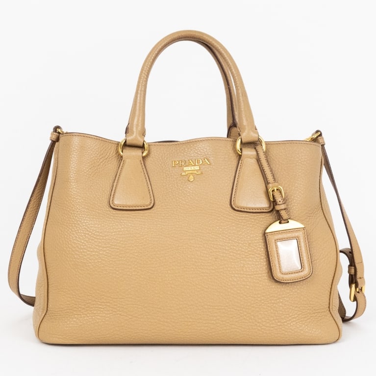 PRADA CONVERTIBLE VITELLO DAINO LEATHER TOTE: *For ALTERNATIVE SHIPPING QUOTES, please visit www.dejavuauctionshipping.com* Prada Convertible Tote Beige Vitello Daino Leather Gold * COLOR: Beige * PRODUCTION CODE: BN2579 / 64 * INCLUDED: Strap, L