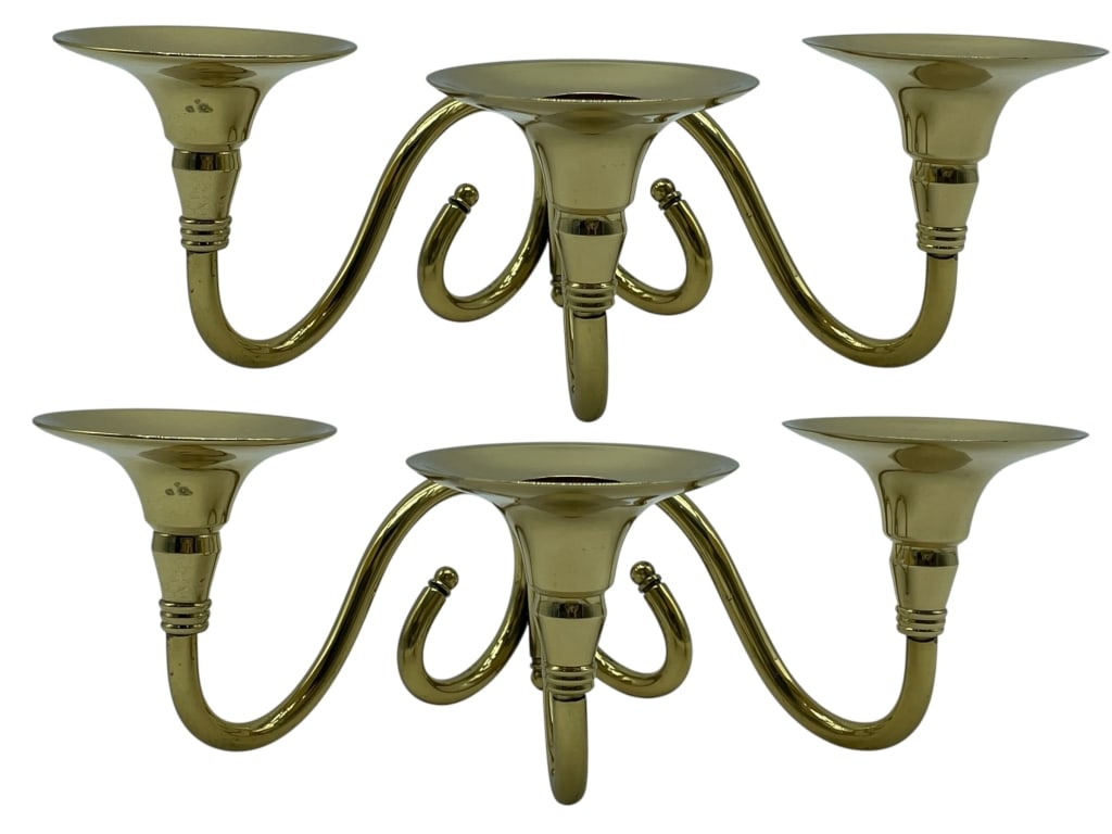 PAIR OF POLISHED BRASS THREE-ARM CANDELABRAS: PAIR OF POLISHED BRASS THREE-ARM CANDELABRAS -Elegant pair of polished brass three-arm candelabras featuring gracefully curved arms and flared candle cups, offering a classic and timeless decorative s
