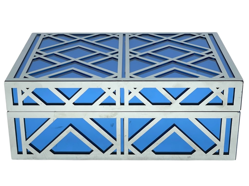GEOMETRIC METAL AND BLUE GLASS DECORATIVE BOX 10": GEOMETRIC METAL AND BLUE GLASS DECORATIVE BOX -Striking decorative box featuring a bold geometric lattice design in a brushed silver-tone metal frame with vibrant blue glass panels. The clean lines an