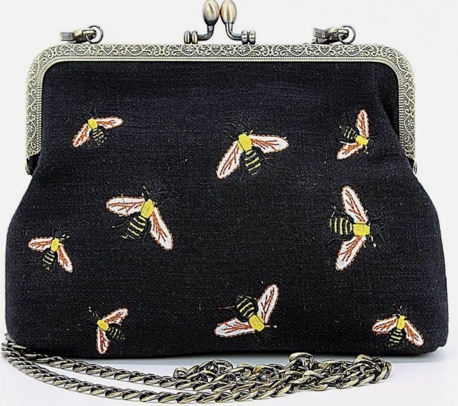 NEW! BLACK BEES KISSLOCK HANDBAG: *For ALTERNATIVE SHIPPING QUOTES or local pick up details, please visit www.dejavuauctionshipping.com* NEW! BLACK BEES KISSLOCK HANDBAG -Kisslock Bees bag is a charming accesssory featuring a nature i