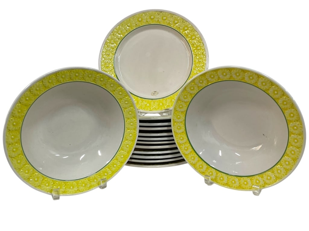 YELLOW DAISY BORDER PORTUGAL DINNERWARE SET: *for competitive shipping options please go to www.dejavuauctionshipping.com -YELLOW DAISY BORDER PORTUGAL DINNERWARE SET – 12 PLATES & 2 BOWLS -Cheerful and vibrant ceramic dinnerware set featuring