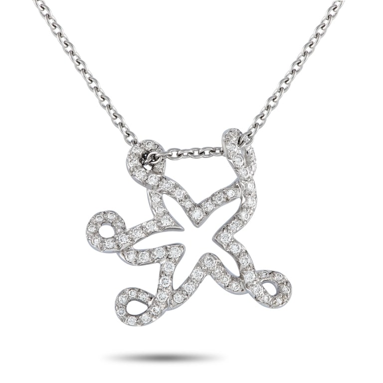 DIOR 18K WG 0.65CT DIAMOND STARFISH NECKLACE: *Note SPECIAL SHIPPING on Luxury Jewelry BELOW* With its whimsical silhouette and captivating yet elegant sparkle, this necklace is bound to be the star of every outfit. This creation by Dior features