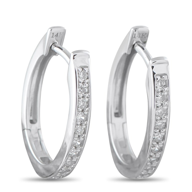 14K WHITE GOLD 0.10CT DIAMOND EARRINGS: *Note SPECIAL SHIPPING on Luxury Jewelry BELOW* These luxury earrings are ideal for everyday wear. Set in 14K White Gold, the rounded design is elevated by Diamonds with a total weight of 0.10 carats.