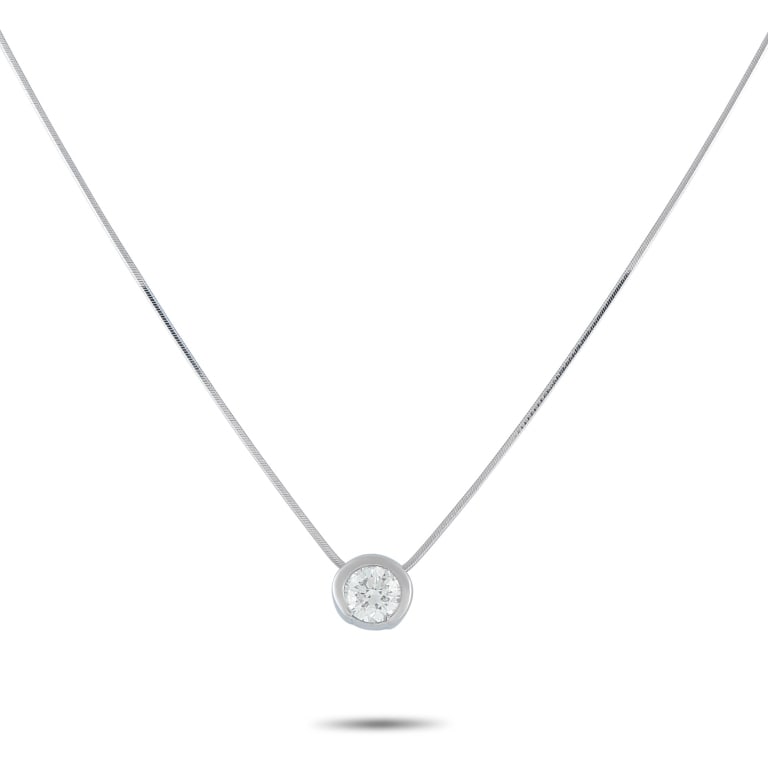 PLATINUM 1.01CT DIAMOND SOLITARE NECKLACE: *Note SPECIAL SHIPPING on Luxury Jewelry BELOW* This necklace is a minimalist piece that will add a touch of luxury to any occasion. Set in Platinum, the pendant features a single 1.01 carat