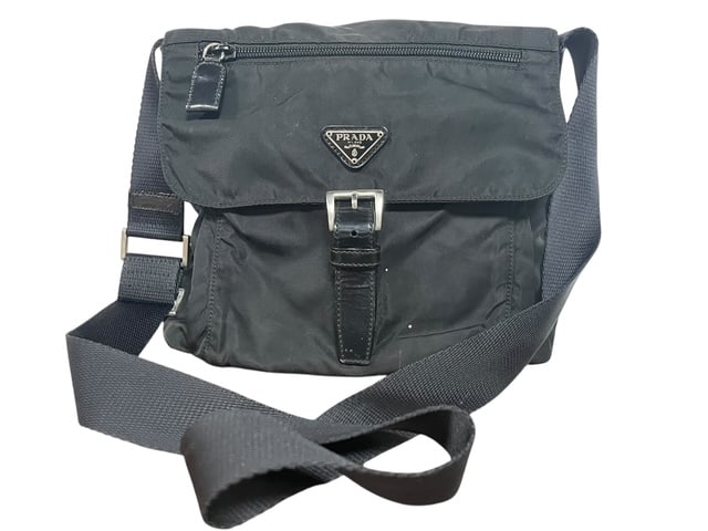 PRADA TESSUTO NYLON LEATHER TRIM MESSENGER BAG SAK: *For ALTERNATIVE SHIPPING QUOTES, please visit www.dejavuauctionshipping.com* - Tessuto line by Prada Milano - Black Nylong with black leather trimwork - Nylon straps to wear as a crossbody or messeng