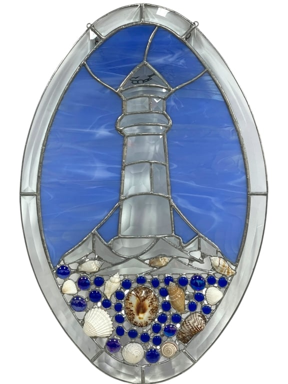 LIGHTHOUSE & SEASHELL STAINED GLASS PANEL 20": *for alternative shipping options please go to www.dejavuauctionshipping.com -COASTAL LIGHTHOUSE & SEASHELL STAINED GLASS PANEL 20" X 13" APPROX -Charming oval-form stained glass panel featuring a sty
