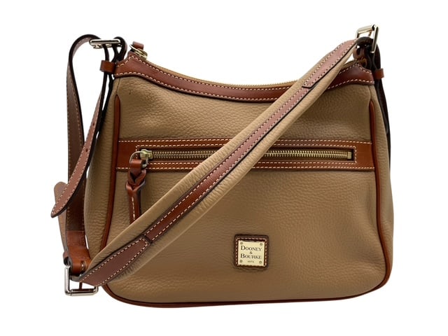 DOONEY & BOUKE TAN PEBBLE GRAIN PRESEY CROSSBODY: *For ALTERNATIVE SHIPPING QUOTES or local PICKUP details, please visit www.dejavuauctionshipping.com*Dooney & Bourke Pebble Grain Presley crossbody bag- Deep tan with reddish trimwork - Long strap