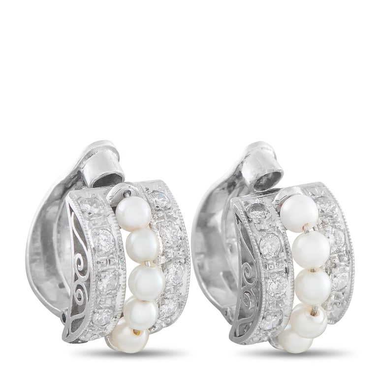 PLATINUM 0.40CT DIAMOND AND PEARL CLIP-ON EARRINGS: *SPECIAL SHIPPING on Luxury Jewelry READ BELOW* These earrings feature a classically elegant design that will never go out of style. Set in Platinum, a series of Pearls accent the center of the curved