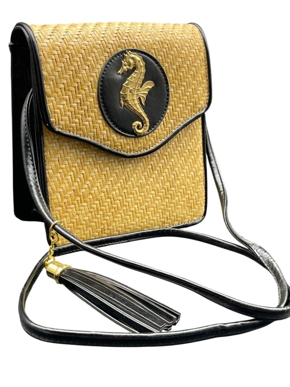 VINTAGE BEE EMBLEM WOVEN STRAW CROSSBODY: For ALTERNATE shipping quote or LOCAL PICK-UP DETAILS, please visit dejavuauctionshipping.com VINTAGE WOVEN STRAW CROSSBODY BAG WITH GOLD SEAHORSE MEDALLION Stylish vintage woven straw handbag featuri